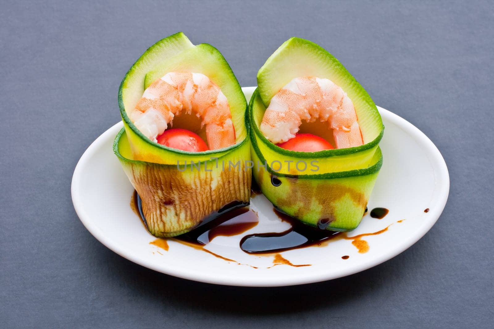 Appetizer with zucchini, shrimp and tomatoes