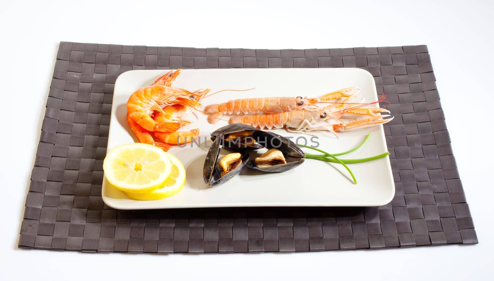 Mussels lemon and crustacean on dish
