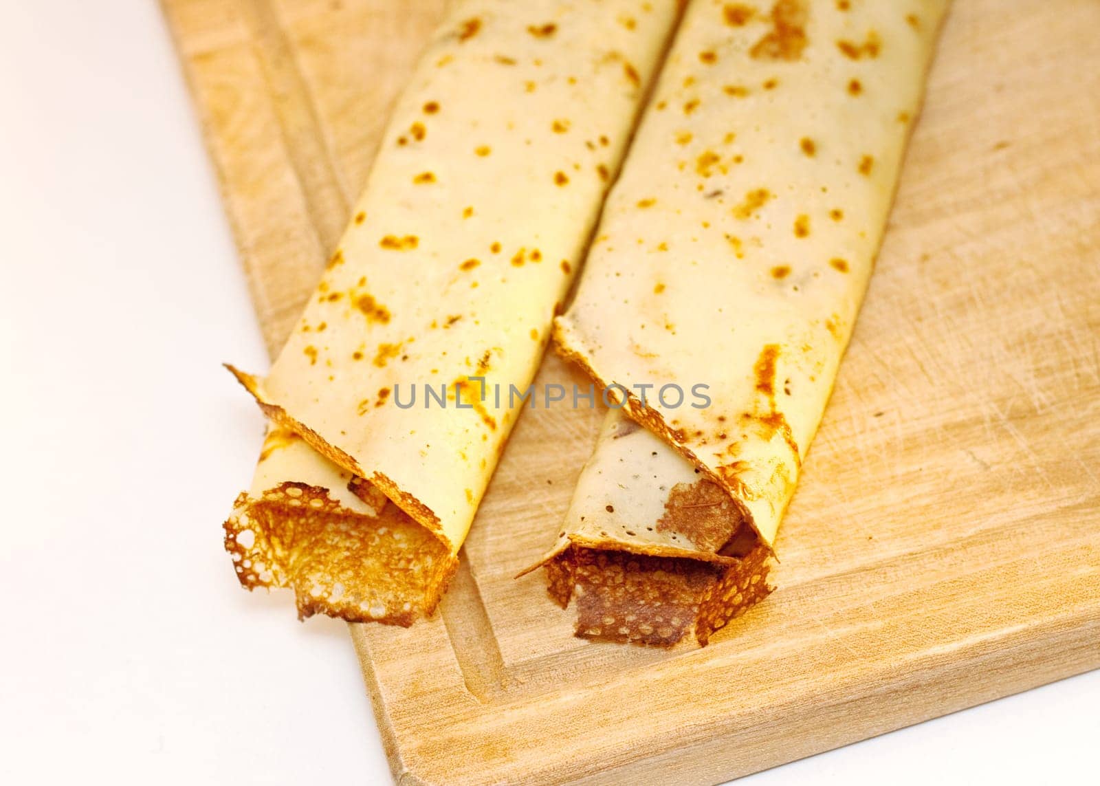Palacinke, crepes on cutting board