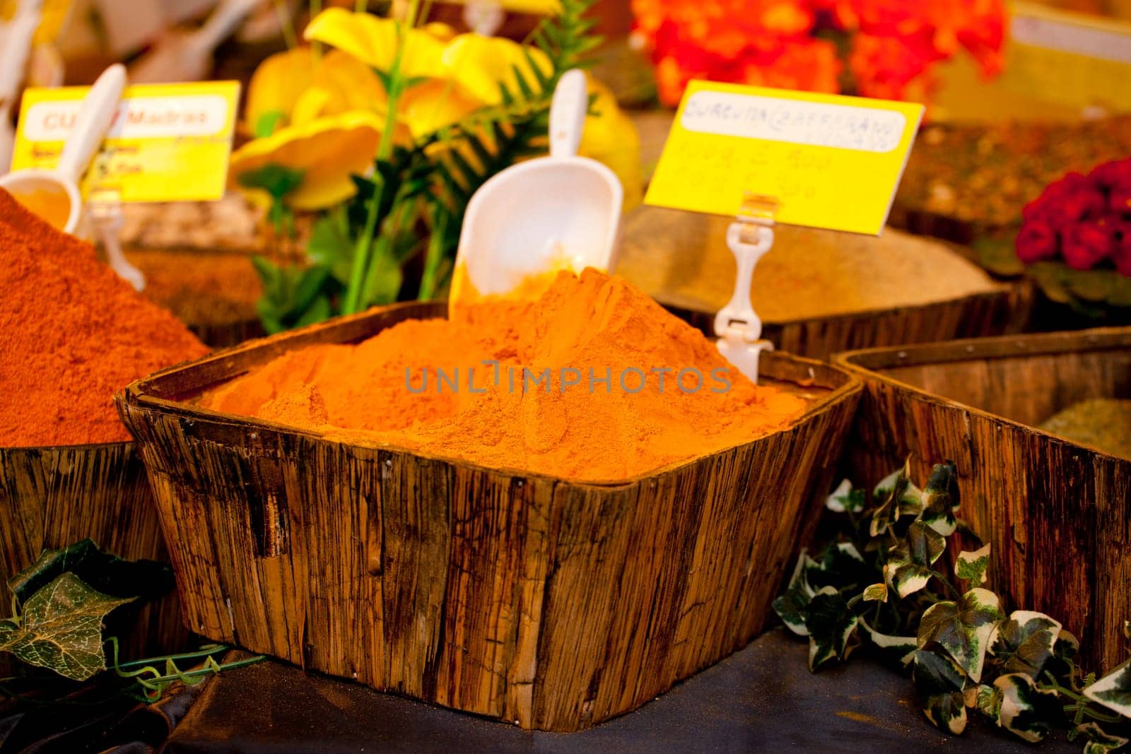 Turmeric on wooden basket in a street market