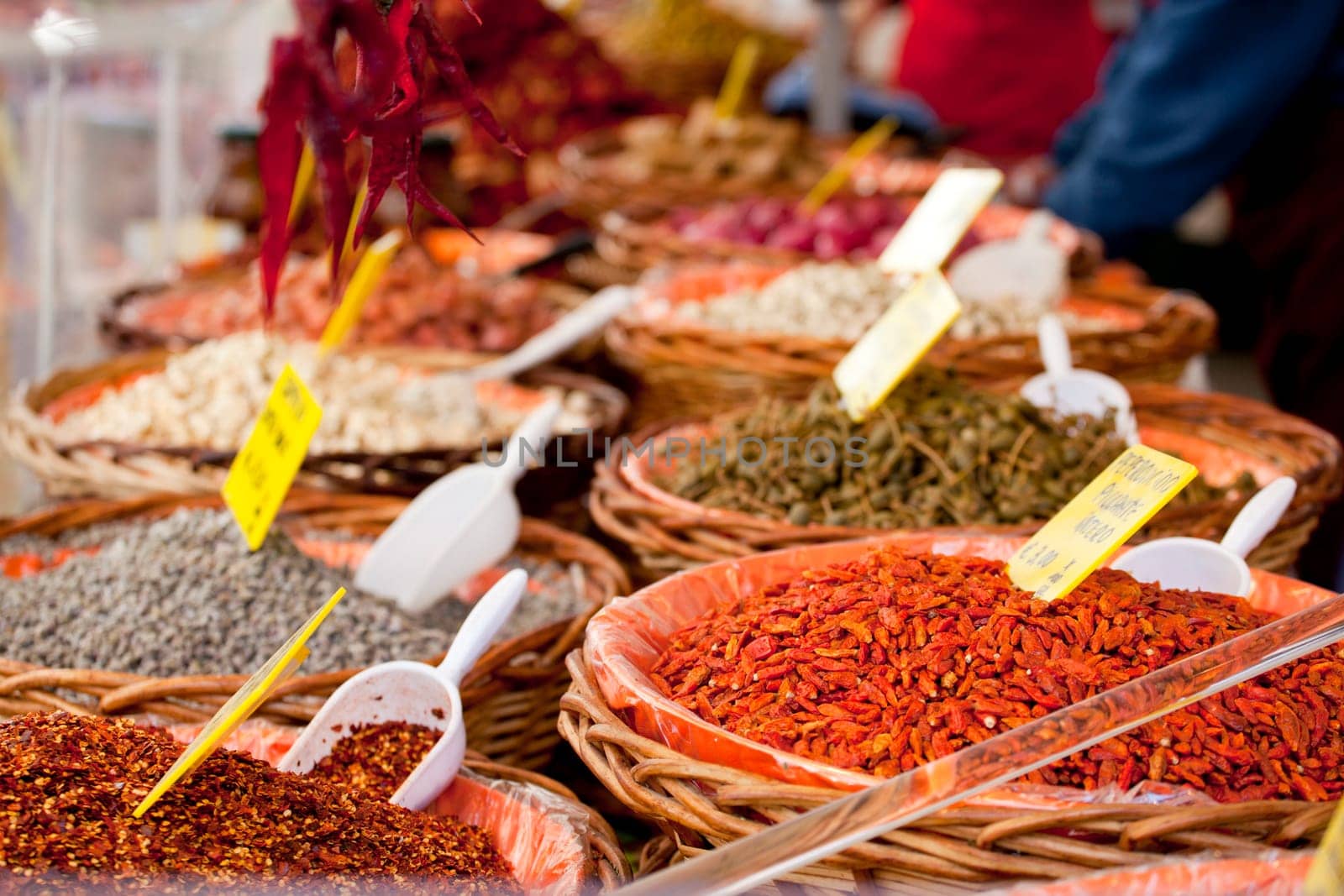 Spices on wooden basket in a street market
