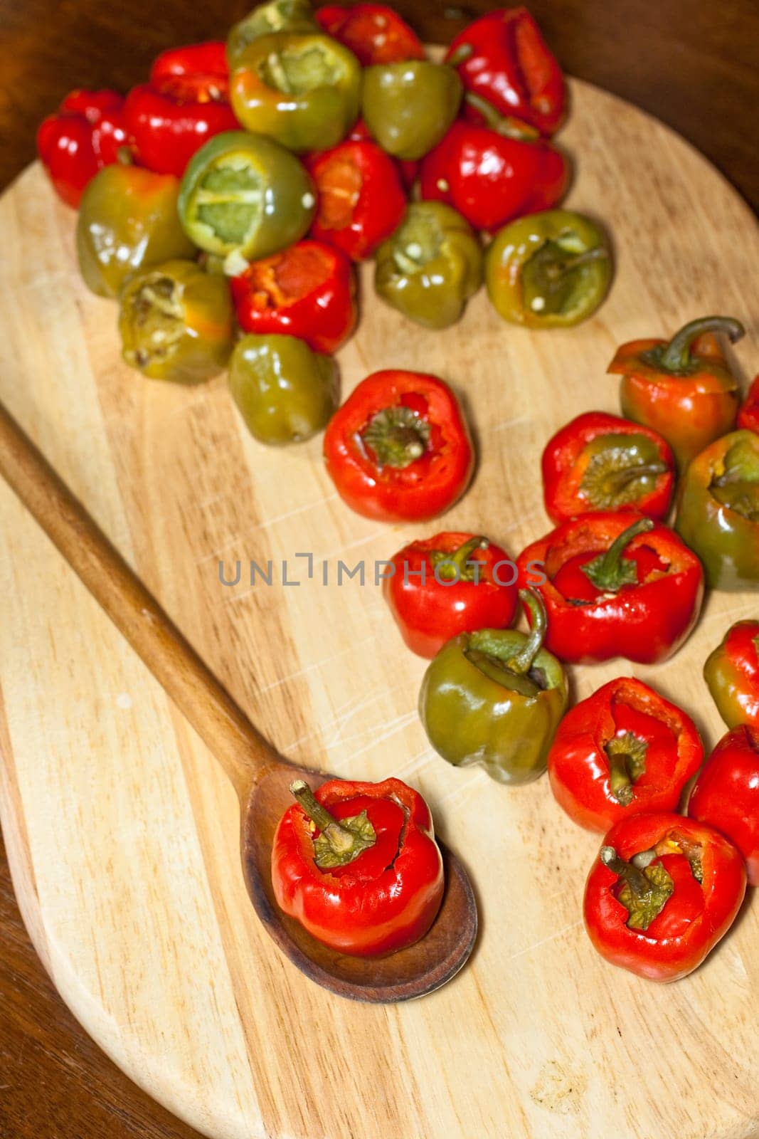 Red hot chili peppers on cutting board