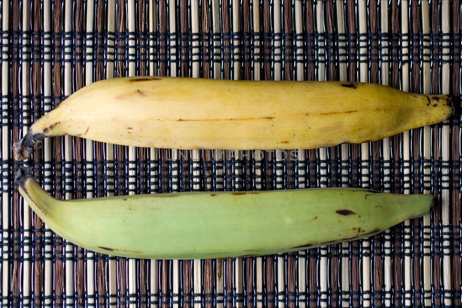 Green and yellow Plantains on placemet