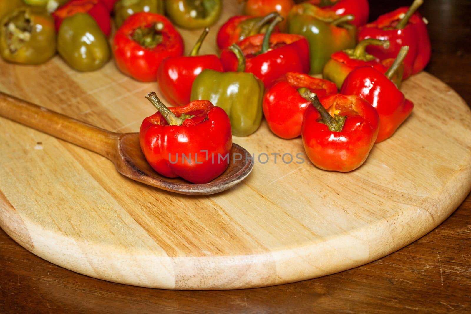 Red hot chili peppers on cutting board