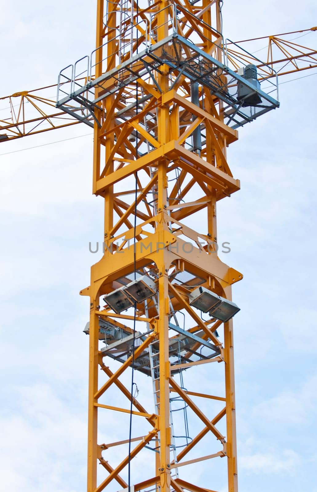 Yellow crane on blue sky