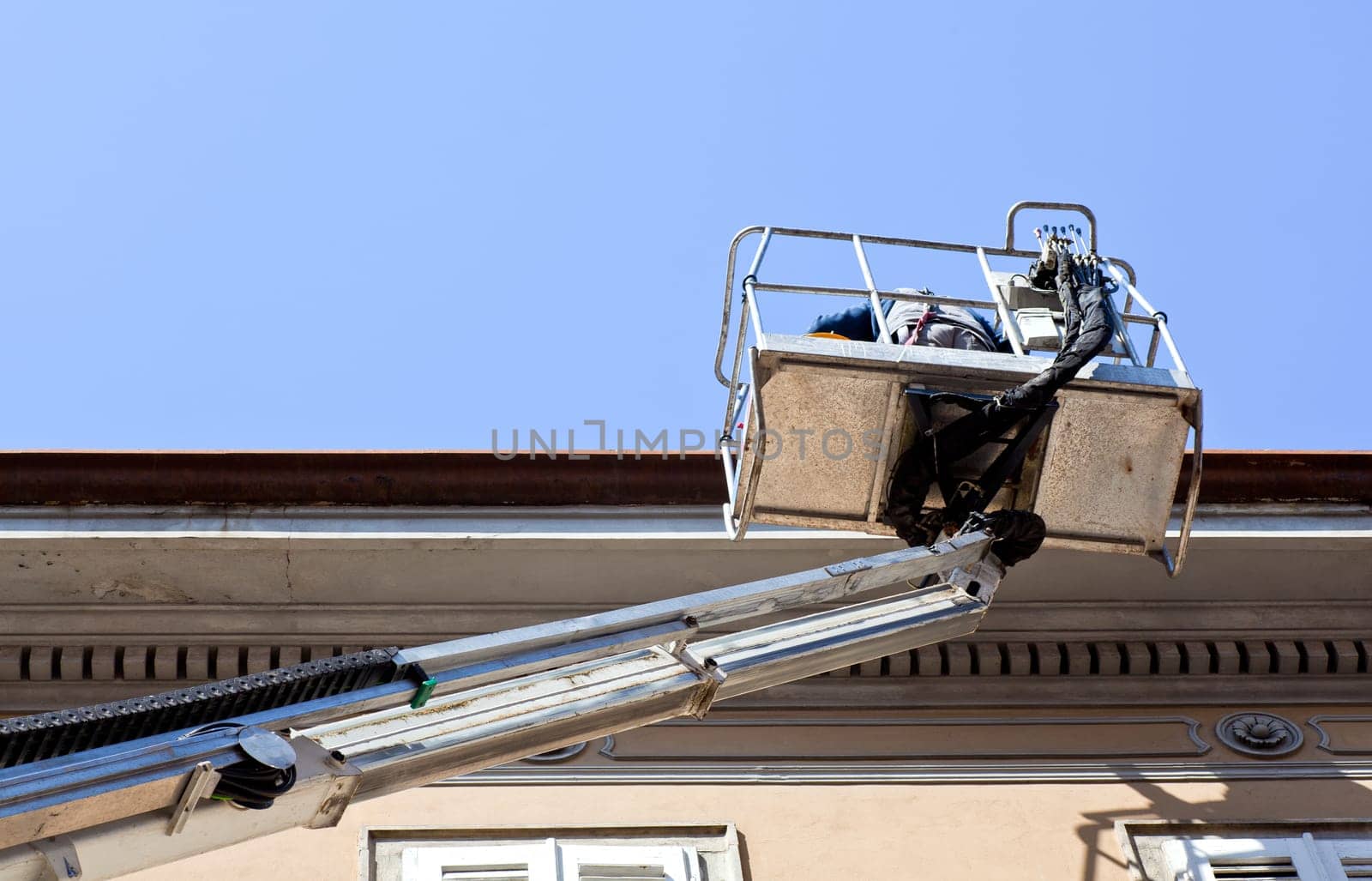 Worker on a mobile crane