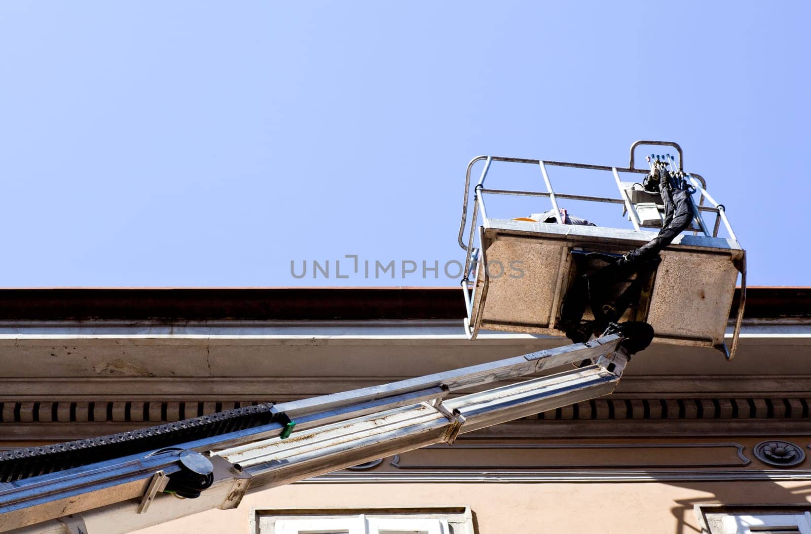 Worker on a mobile crane