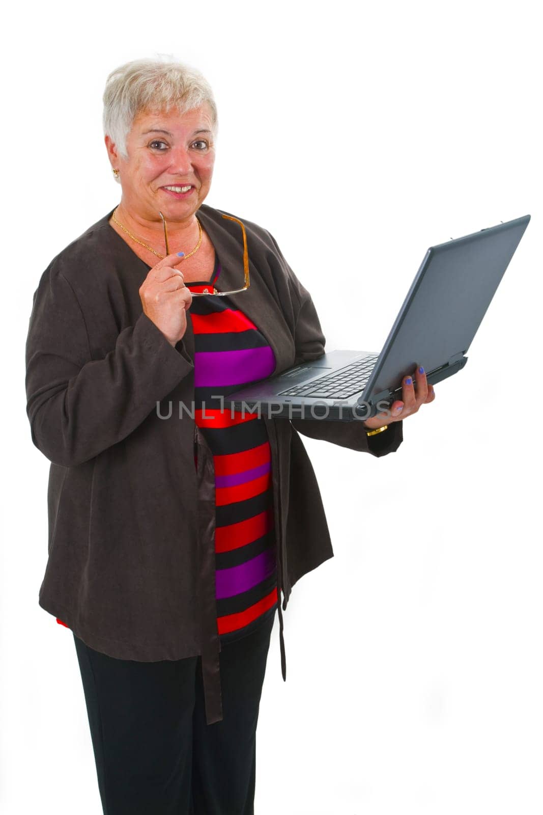 Senior woman using laptop - isolated on white background