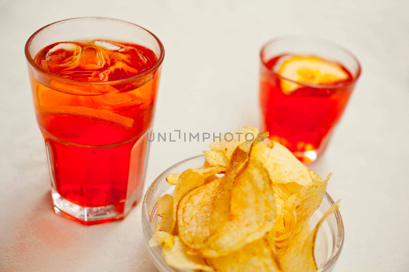 Spritz drink and potato chips