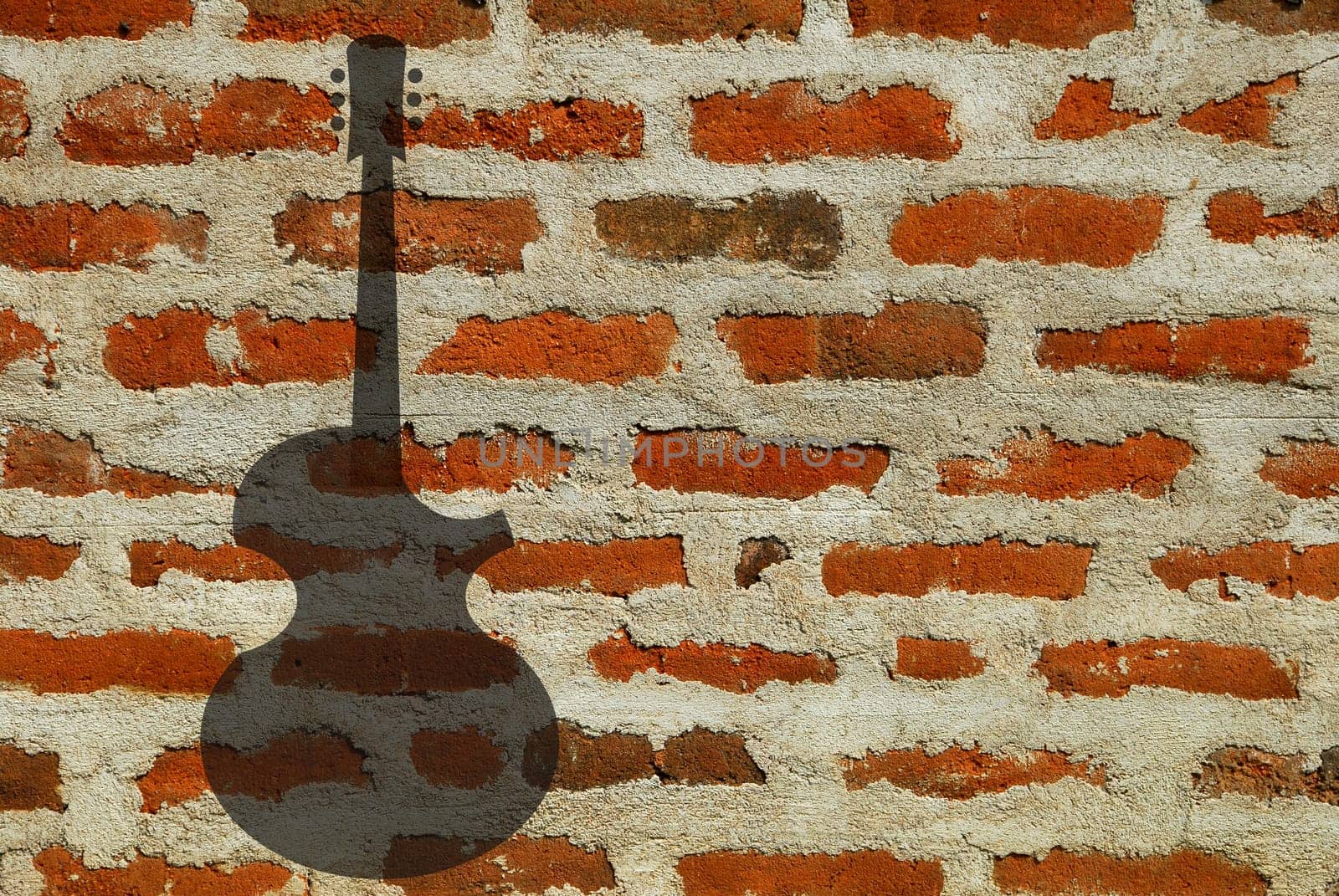 guitar hanging on a wall