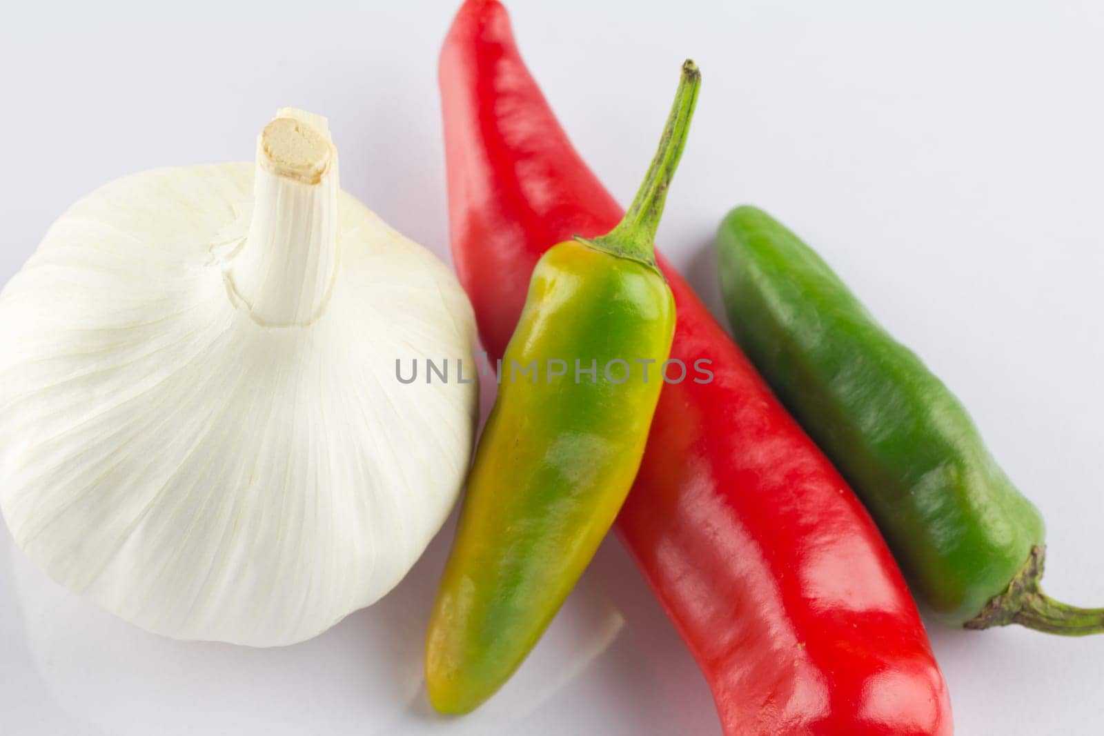An aromatic garlic bulb and hot chillies