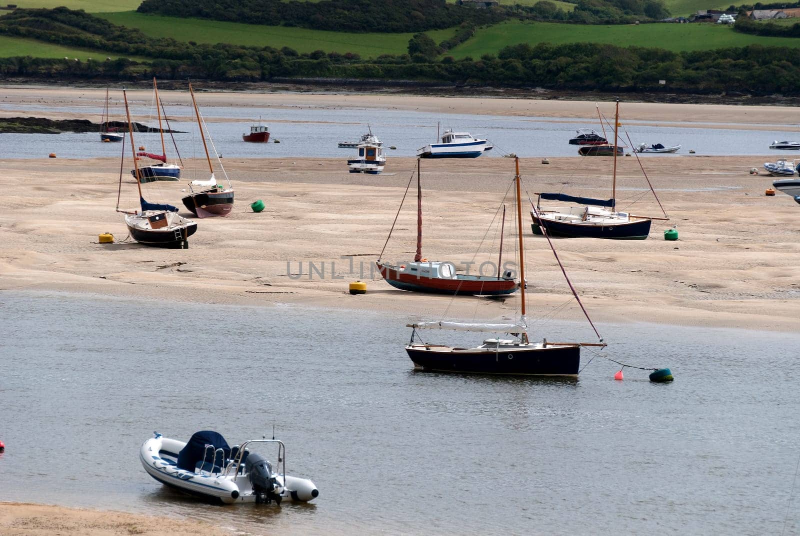 Boats at low tide at Wadebridge in Cornwall
