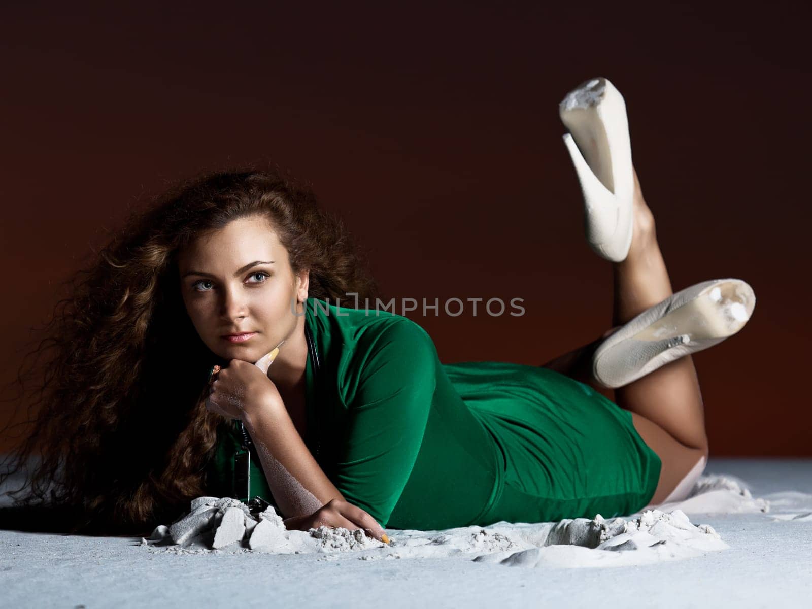 Beautiful woman with long hair in desert