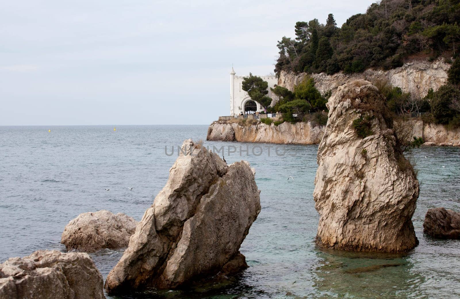 Rock on the sea, Miramare castle. Trieste - Italy
