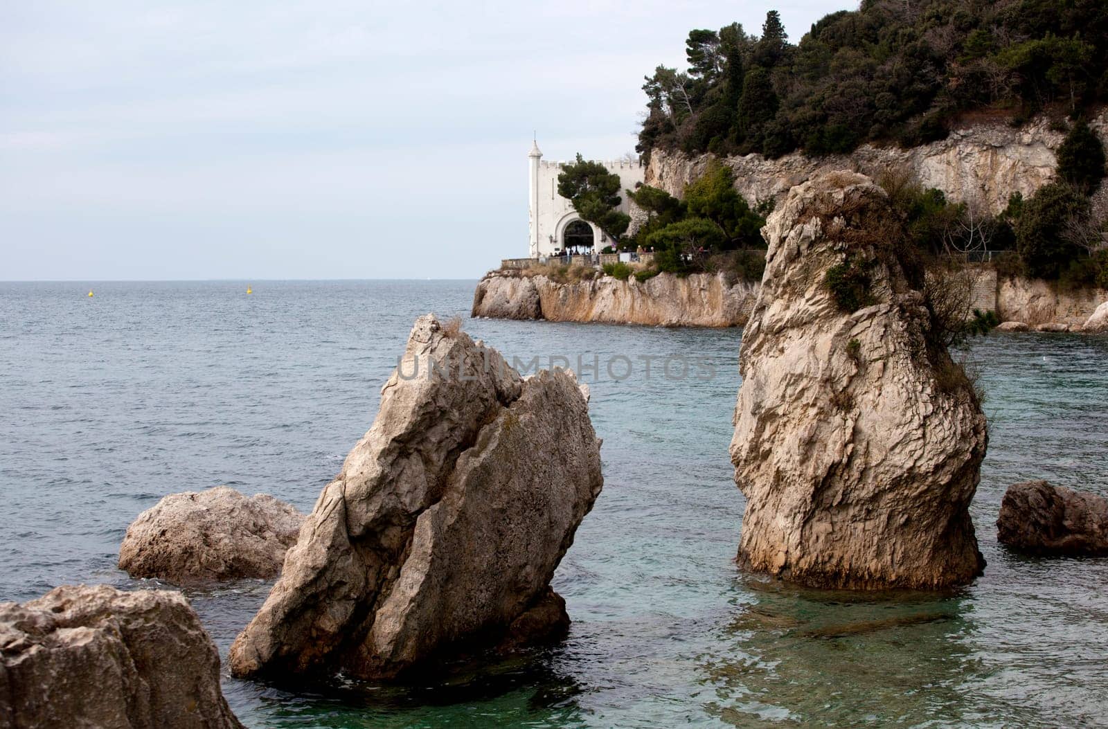 Rock on the sea, Miramare castle. Trieste - Italy