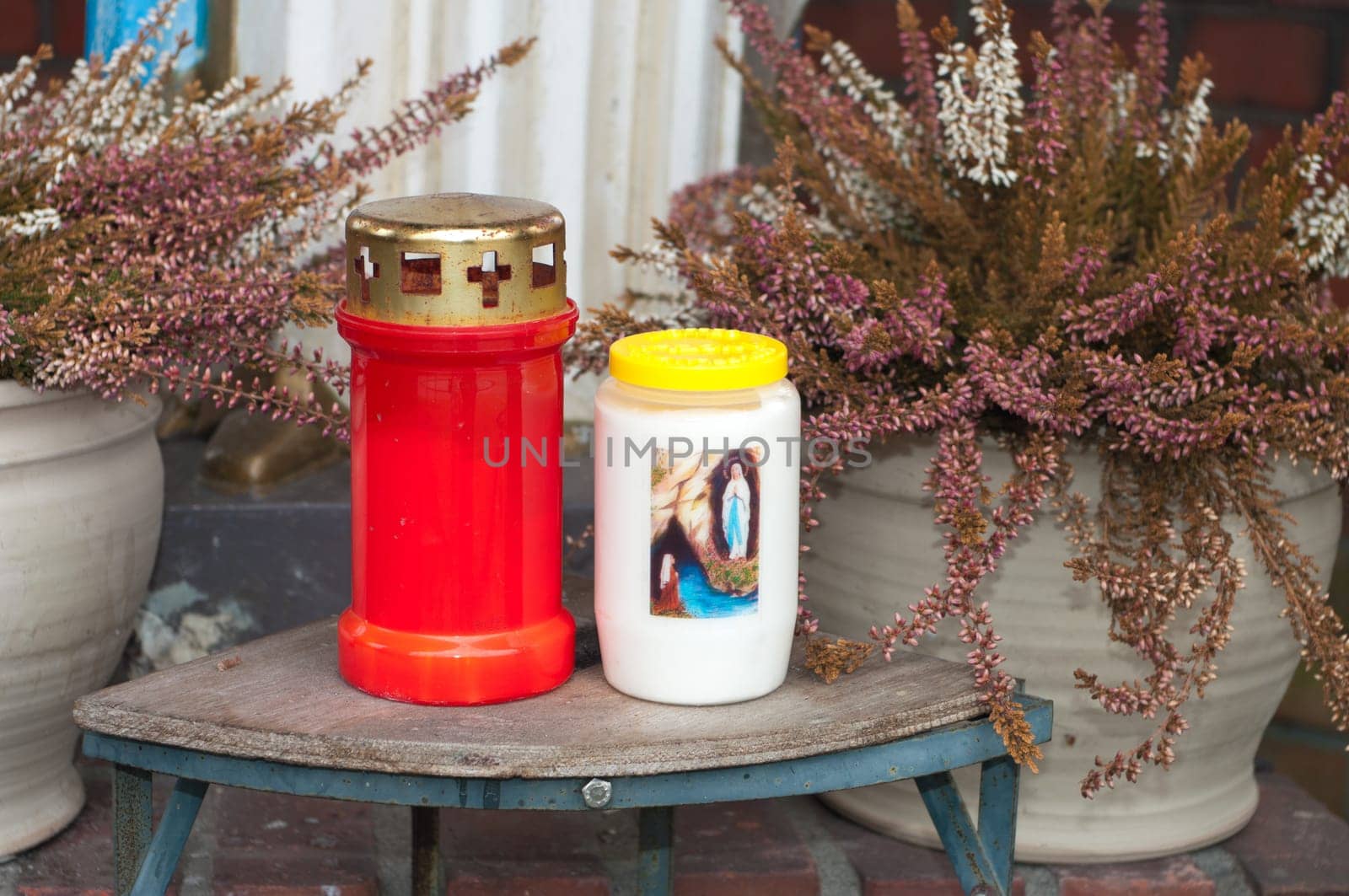 two religious candles in a small chapel