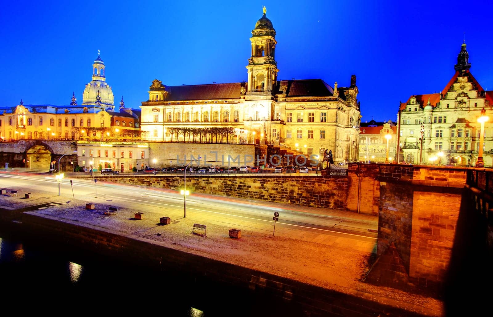 View from the Augustus Bridge to the old town silhouette of Dresden at dusk