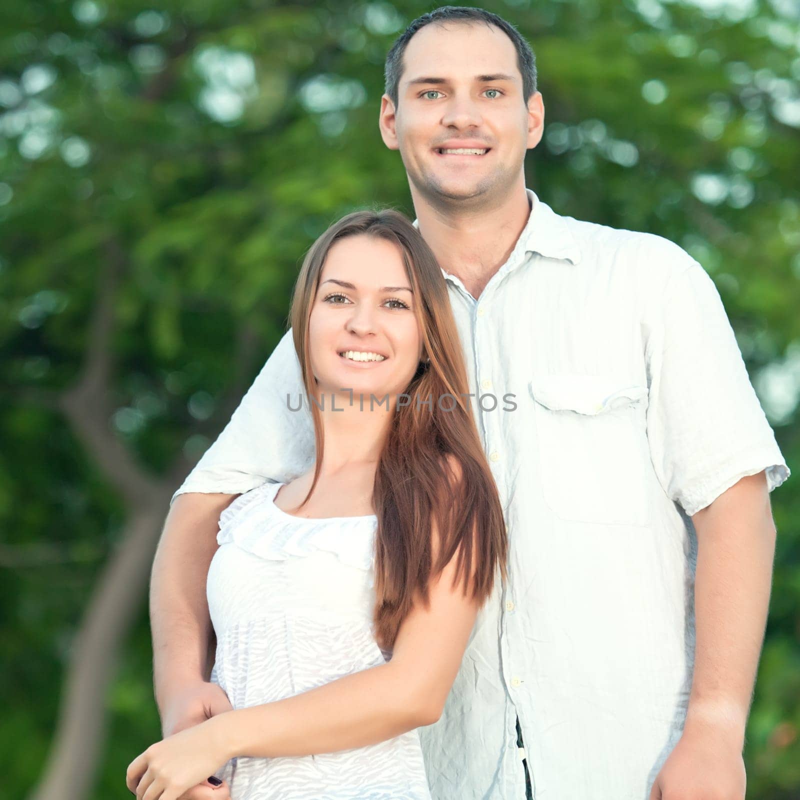 Portrait of a young smiling couple outdoor