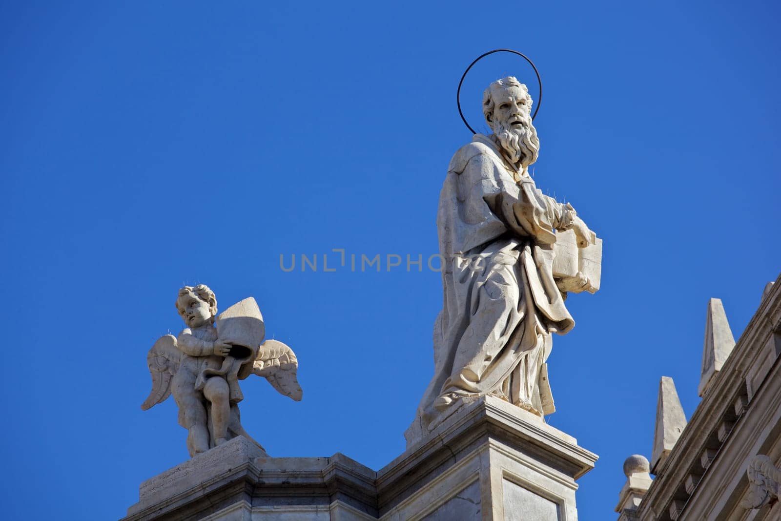 Statue of an ancient religious figure on the Catania cathedral
