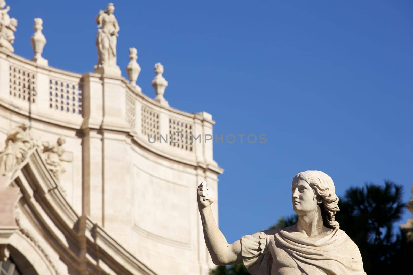 Statue of an ancient religious figure next to the cathedral of Catania