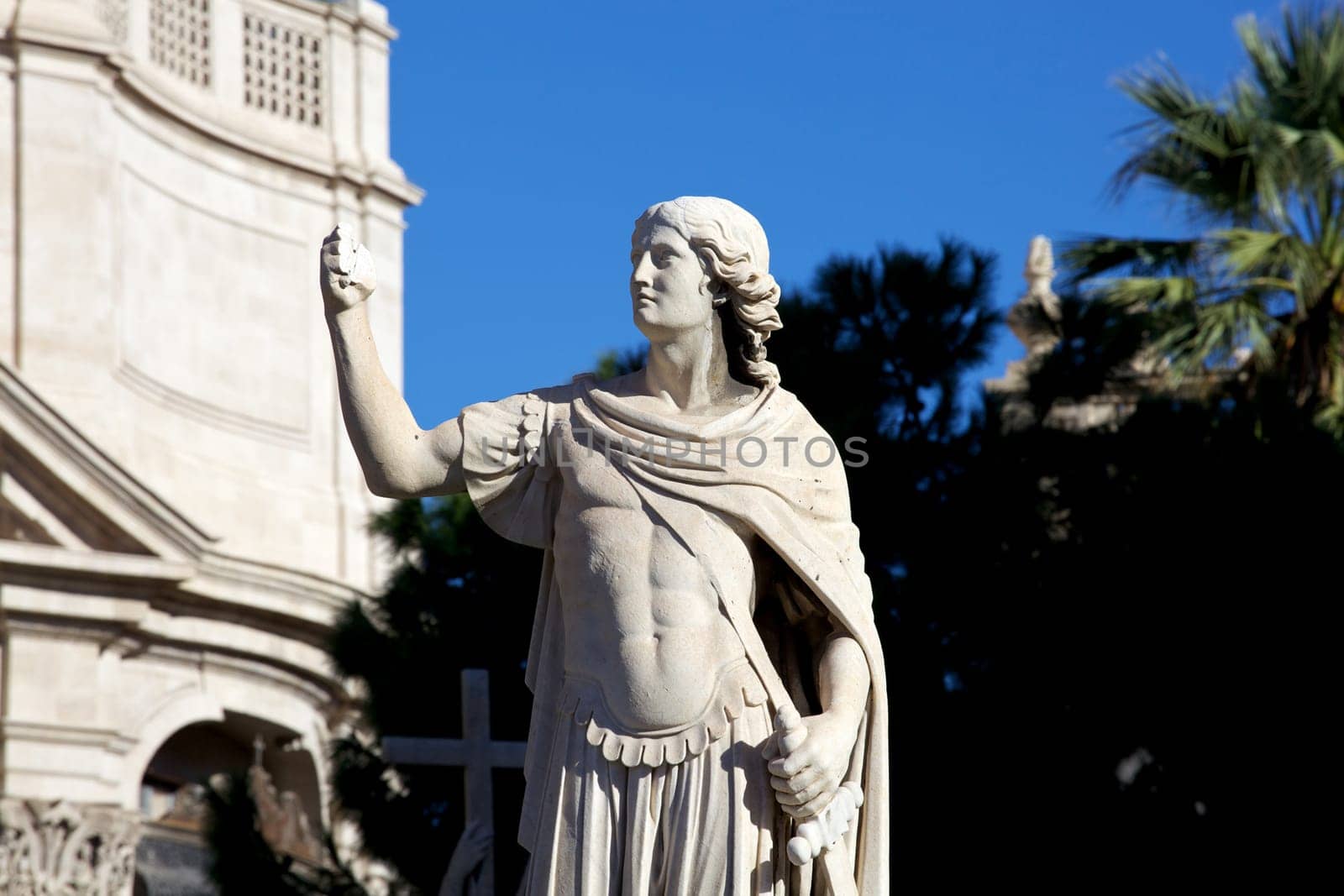 Statue of an ancient religious figure next to the cathedral of Catania