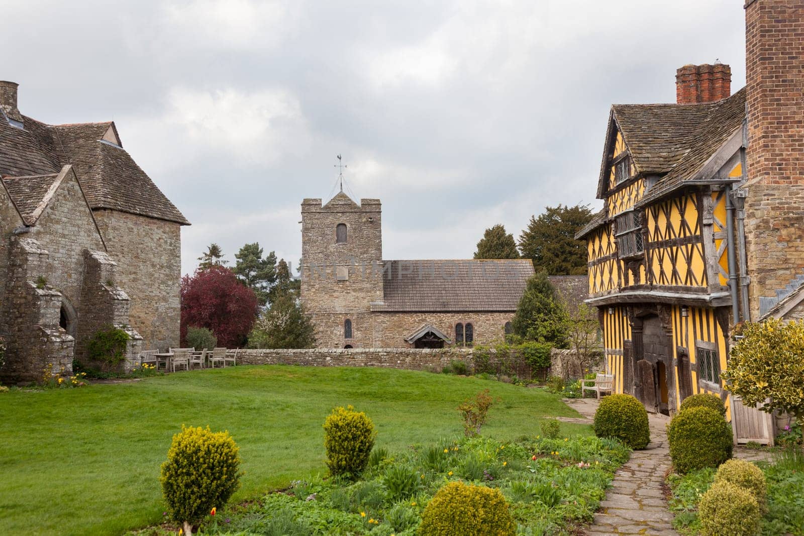 Gatehouse entrance to Stokesay castle on a dark cloudy day