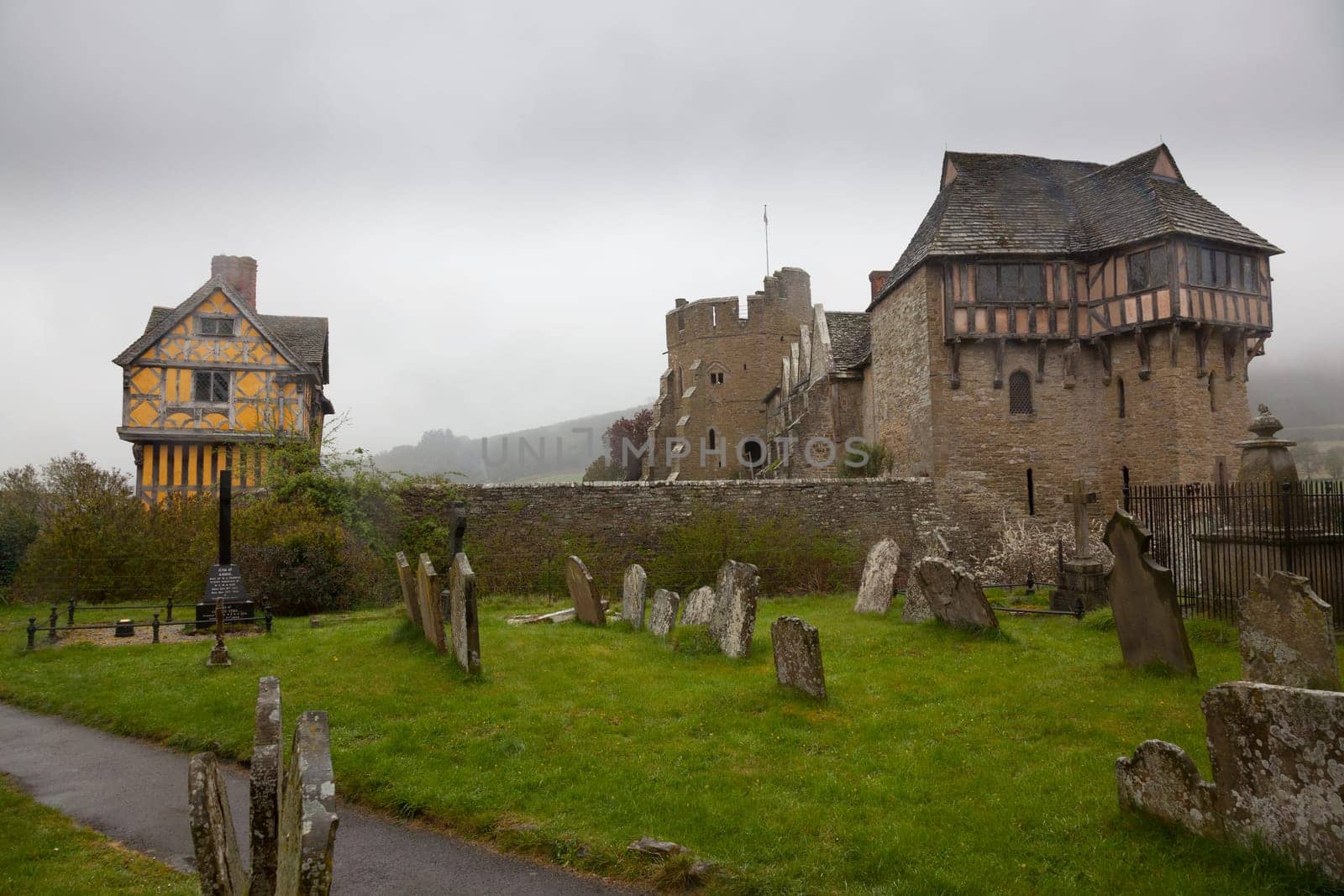 Stokesay Castle in England on damp raining day from cemetery