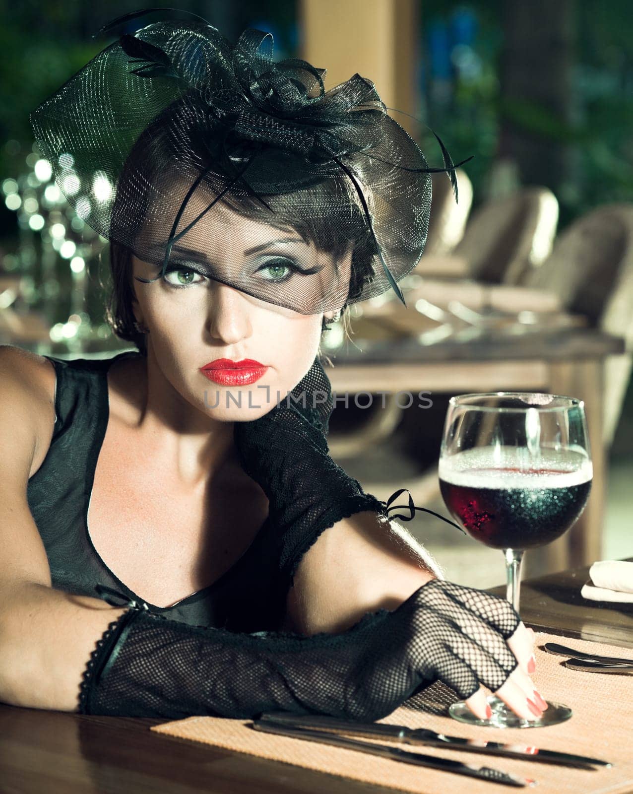 Fashion woman retro portrait in a restaurant