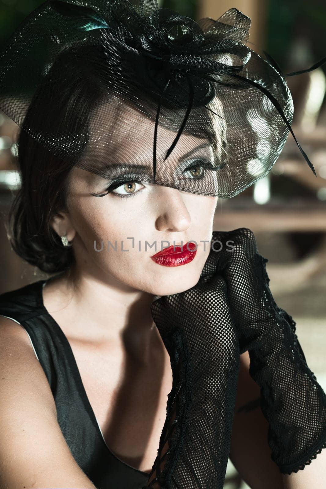 Fashion woman retro portrait in a restaurant