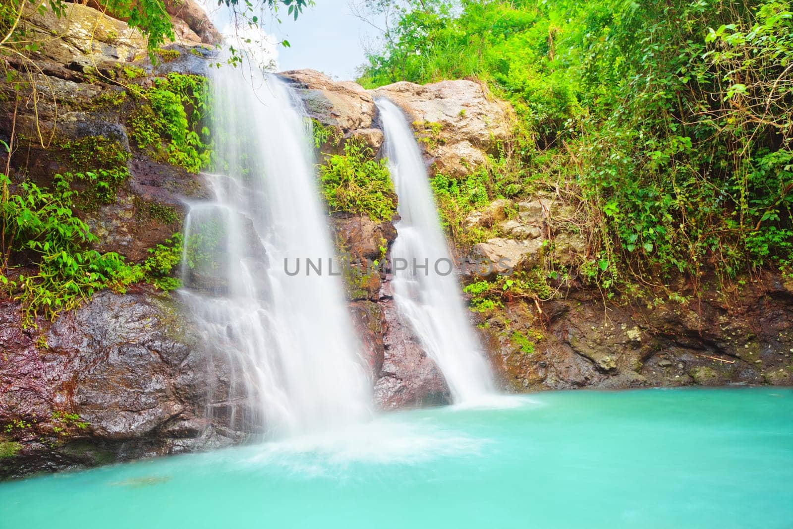 Beautiful waterfall at summer sunny day. Bali
