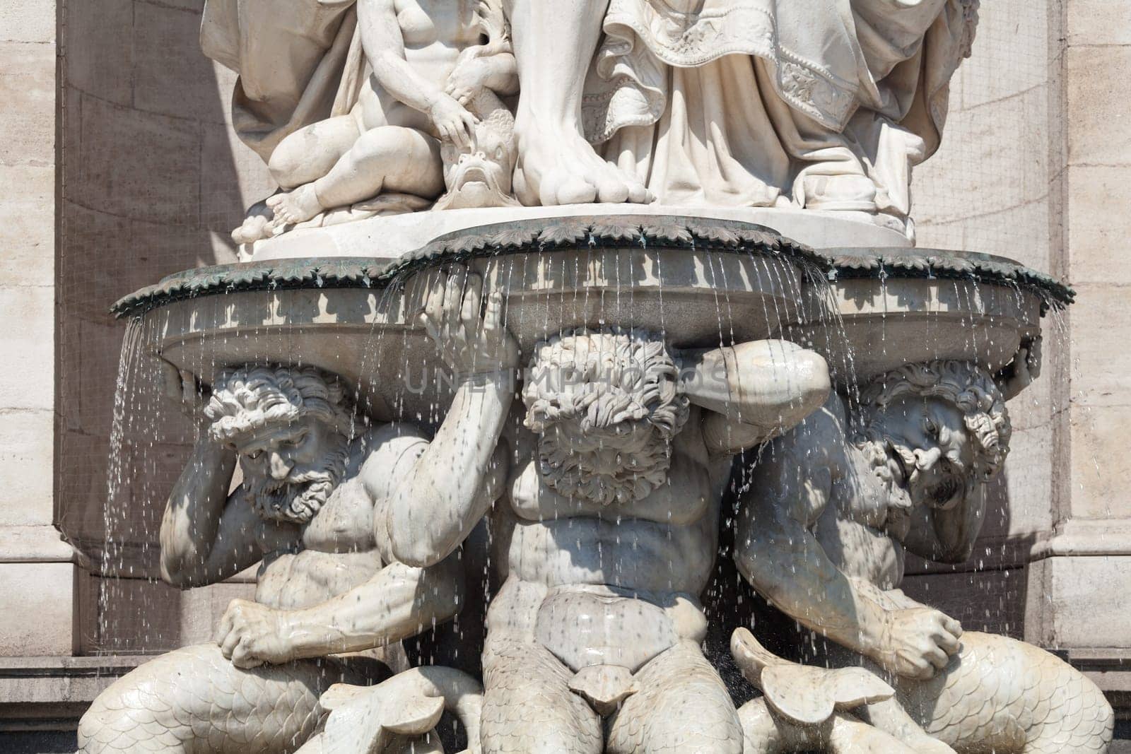 Statue in front of the Albertina,Vienna,with fountain in the inner city