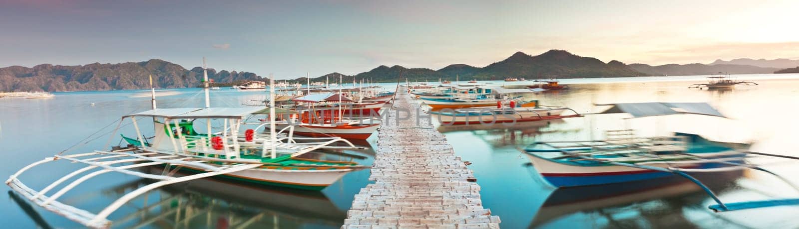 Panorama of the wooden pier in Coron
