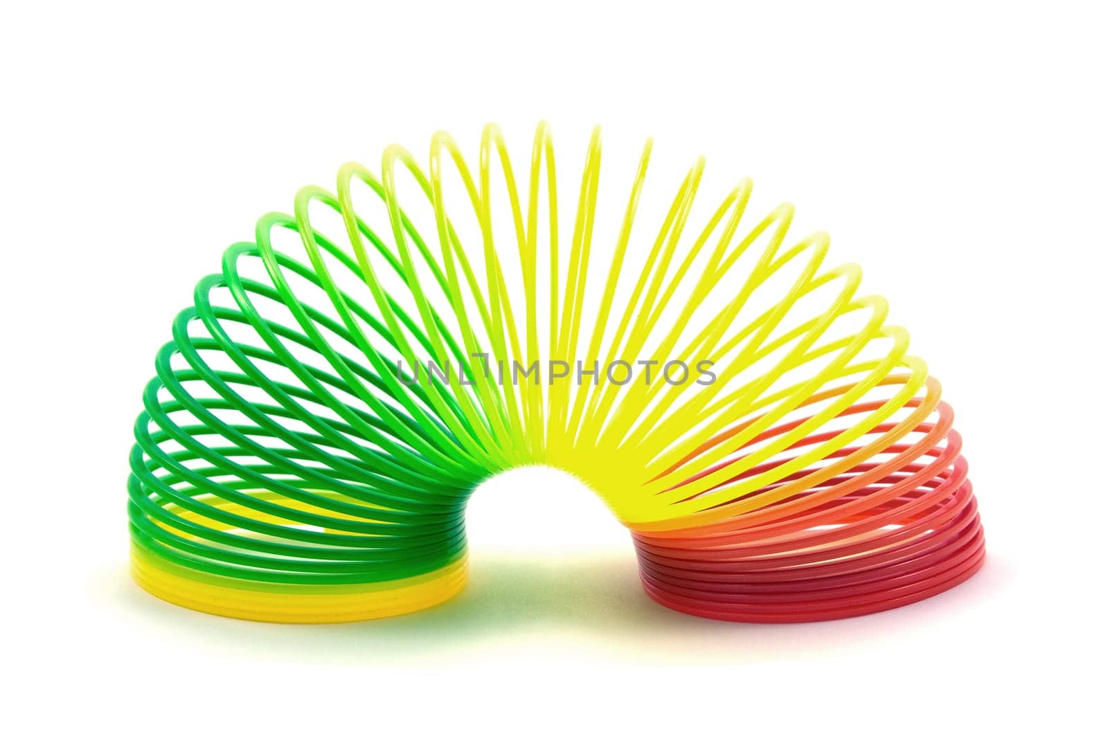 Colorful toy spring isolated on white background