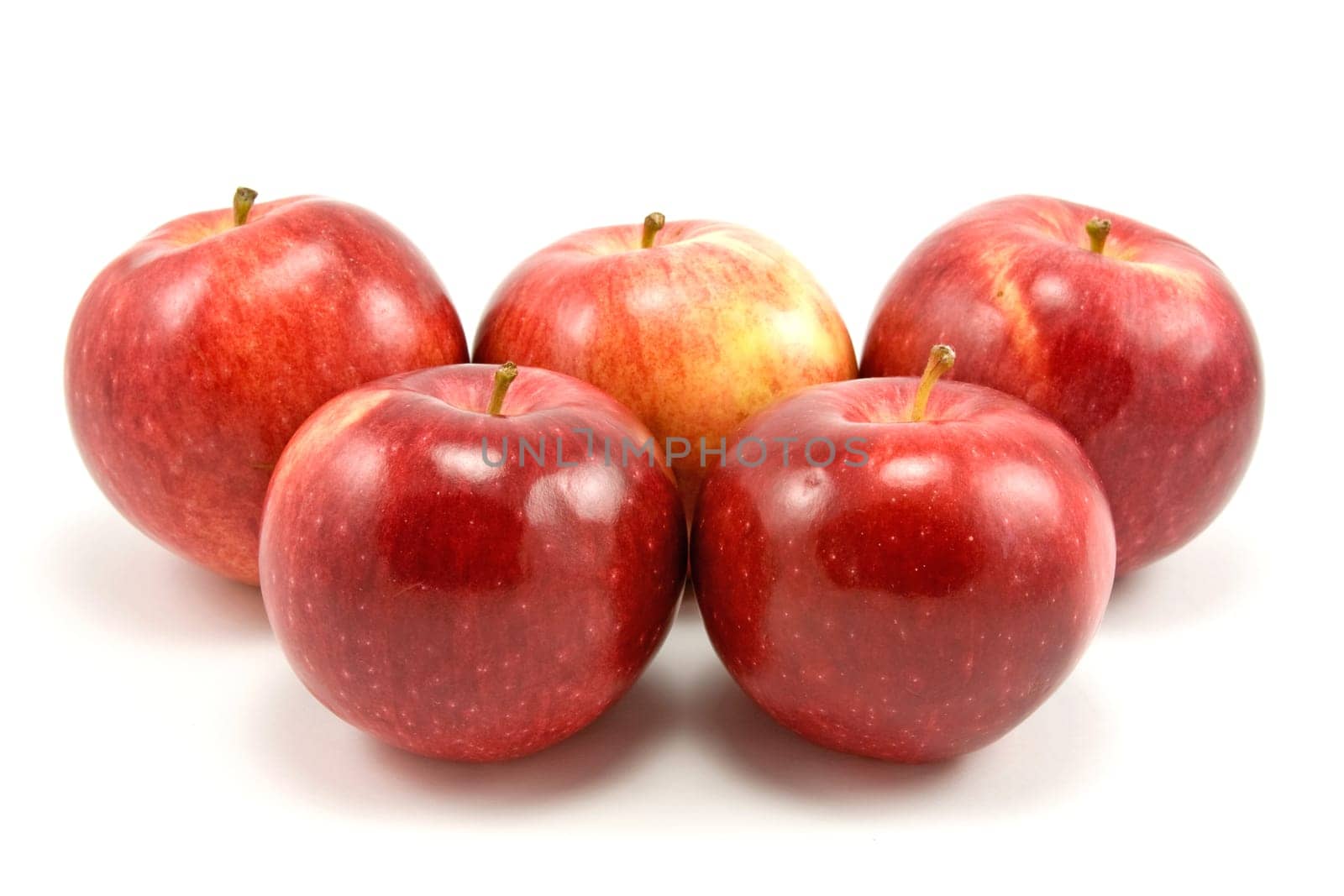 group of red apples on white background