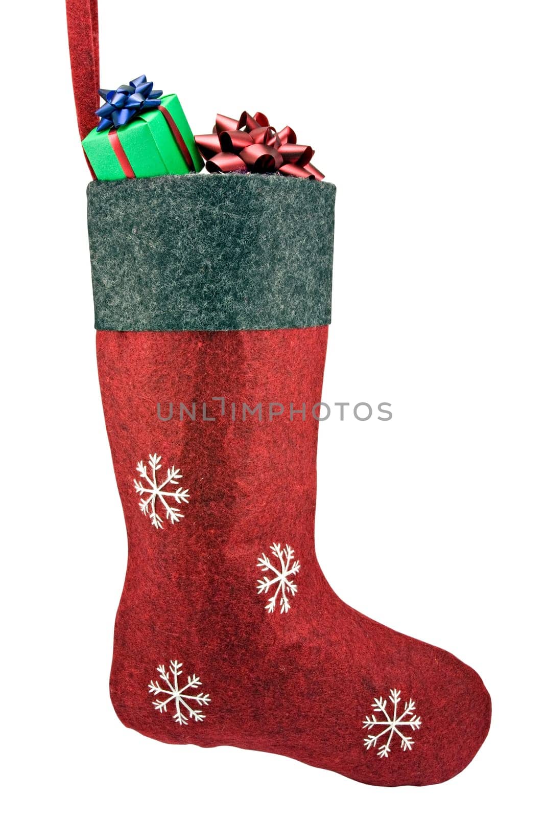 red christmas sock full of gifts. isolated on white