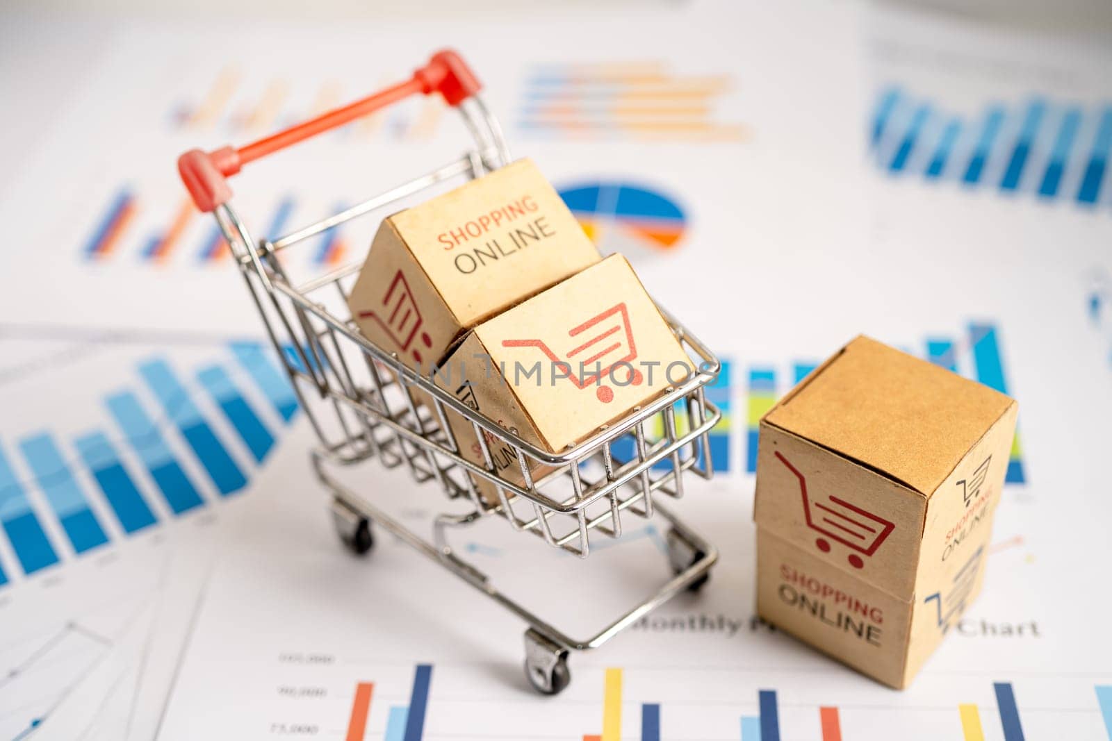 Shopping cart logo on box on graph. Banking Account, Investment economy, trading, Business import export transportation online.