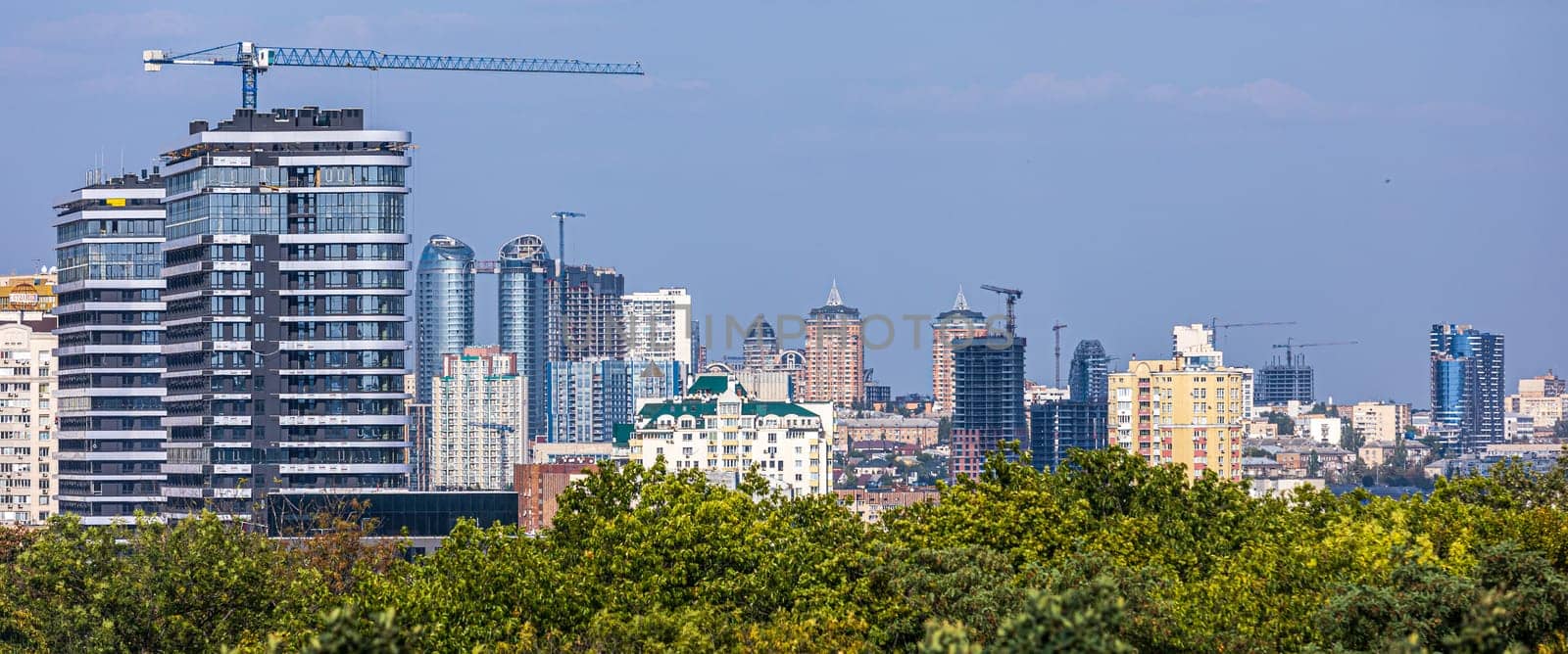 Aerial photography of residential areas of Kyiv with a view of the railway station and new skyscrapers under construction, aerial view, city photography. Copy space by sarymsakov
