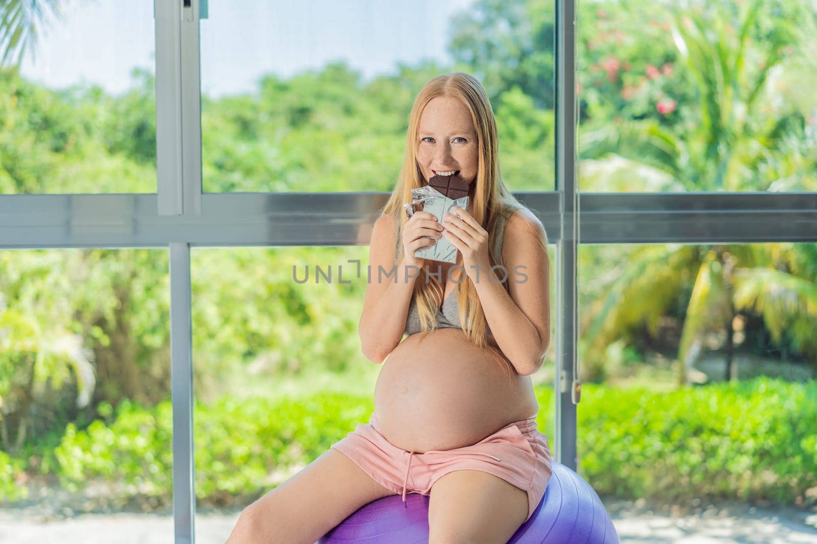 Capturing a pregnant woman enjoying chocolate, exploring the sweet indulgence during pregnancy, highlighting the delightful moments and potential effects of chocolate.