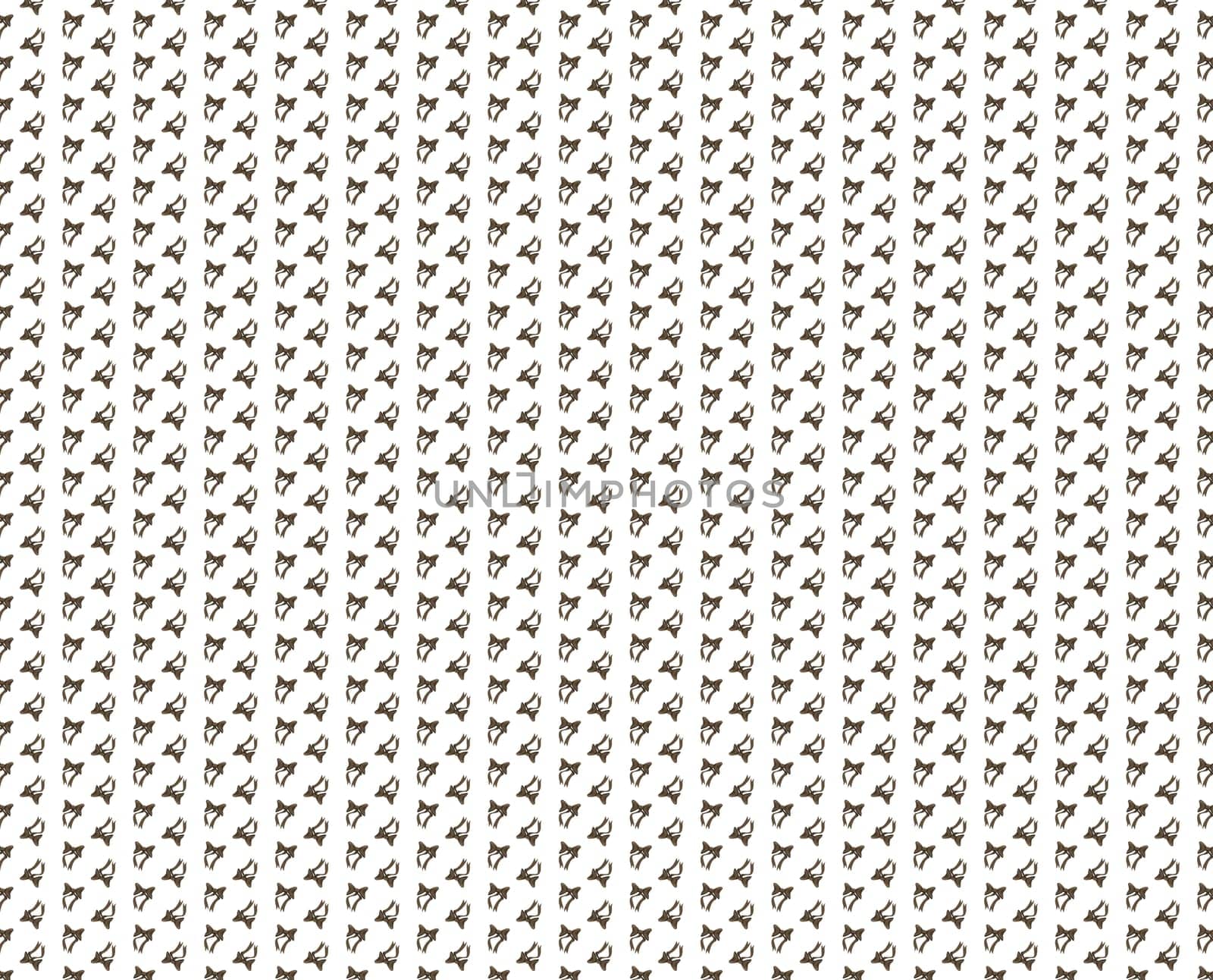 small brown flakes scattered on white background