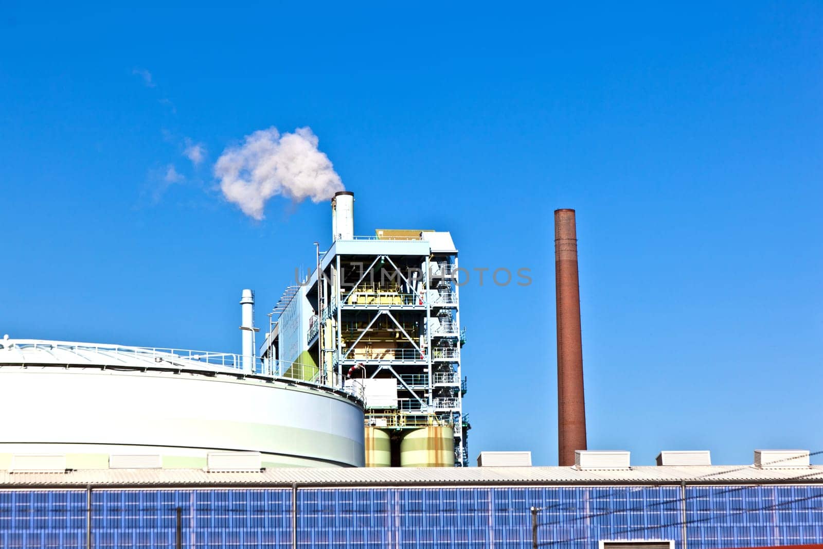 Industry park with silo and chimney