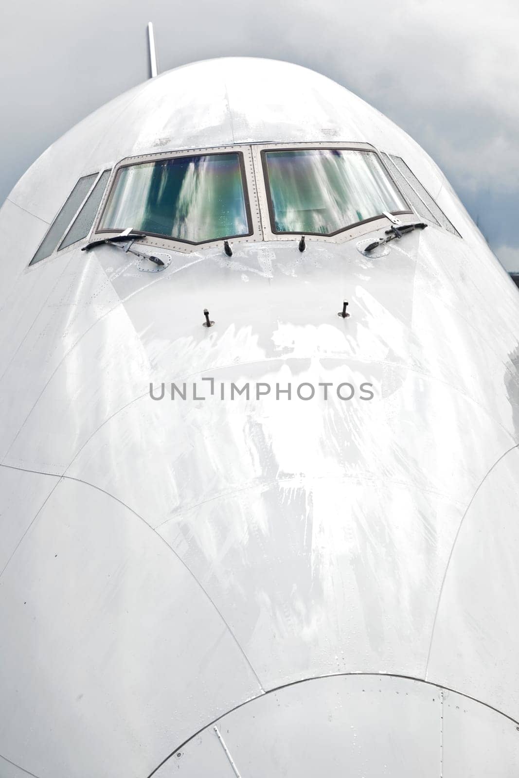 detail of aircraft nose with cockpit window