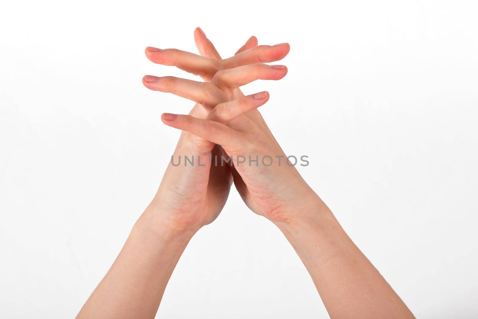 A womans hand is shown in yoga gesture