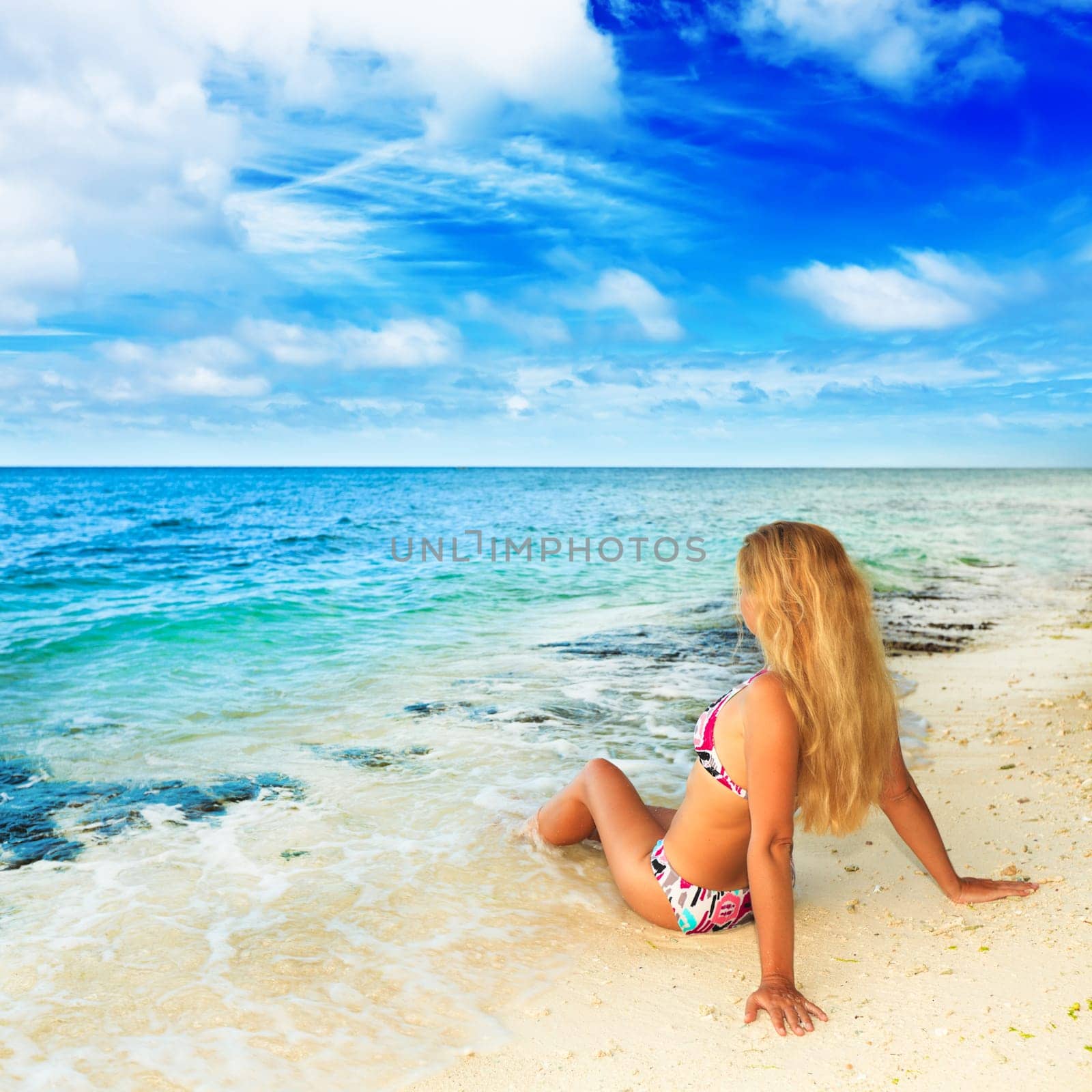 Beautiful woman in bikini on the beach