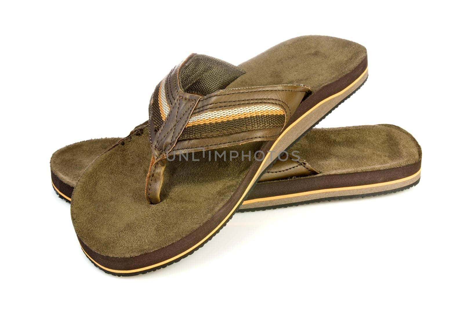 Pair of men&#039 s flip flops over a white background