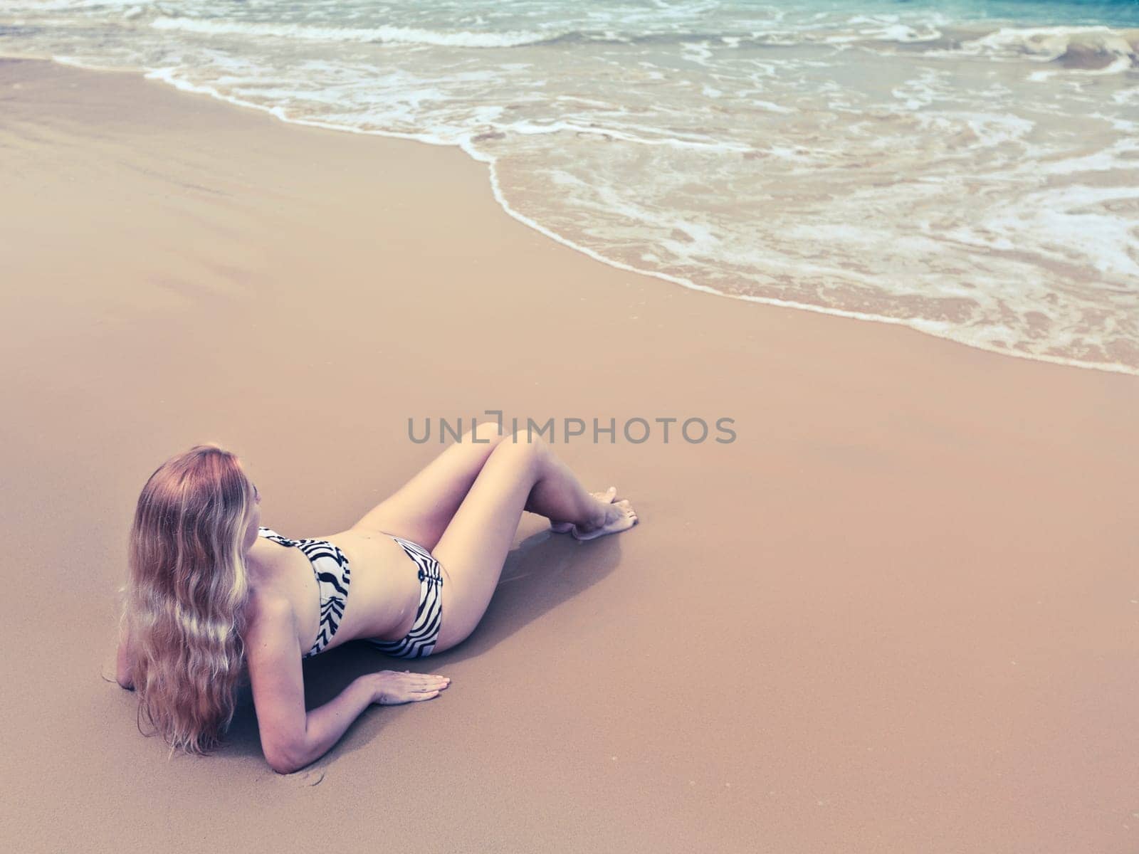 Beautiful woman in bikini on the beach