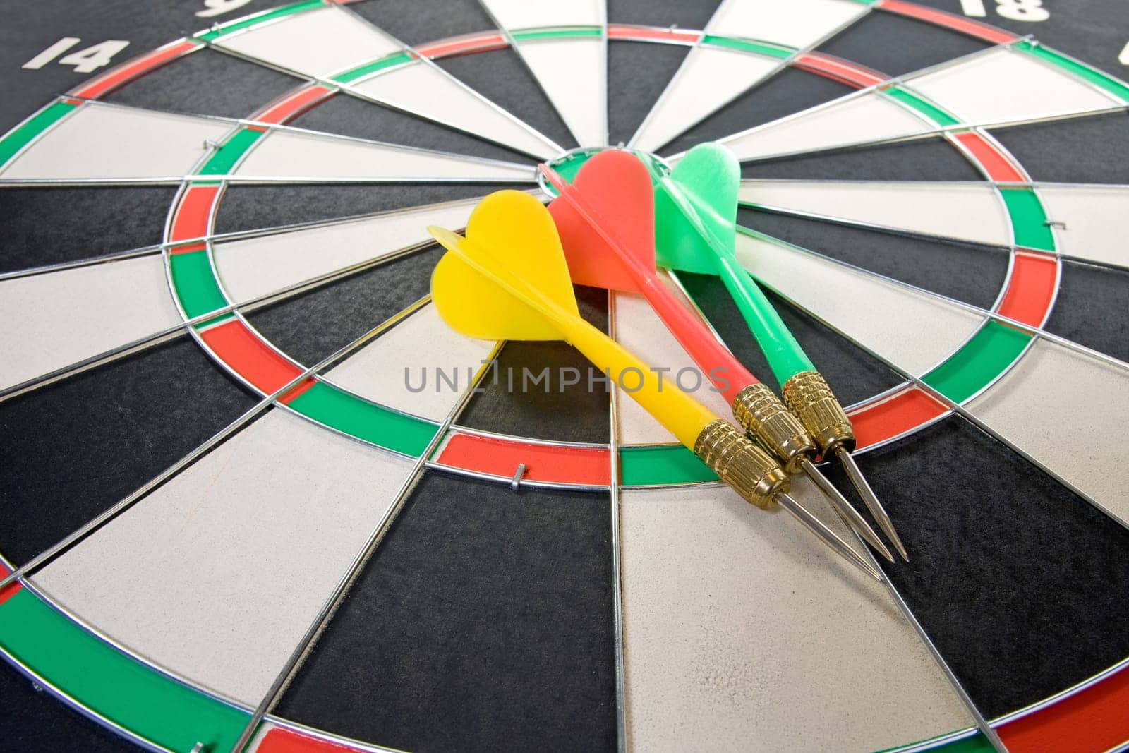 three color darts on the dart board