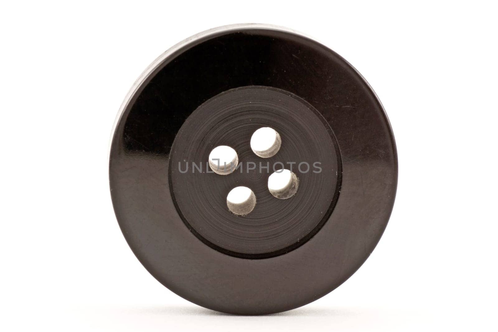 black clothes button ,isolated on white background