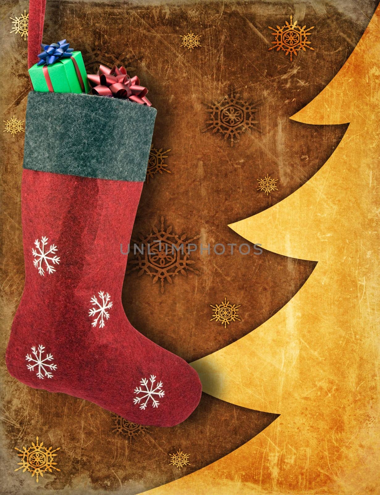 Christmas stocking with gifts on winter background