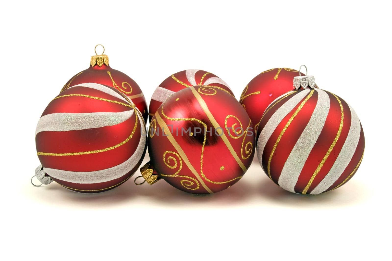 set of christmas baubles over a white background