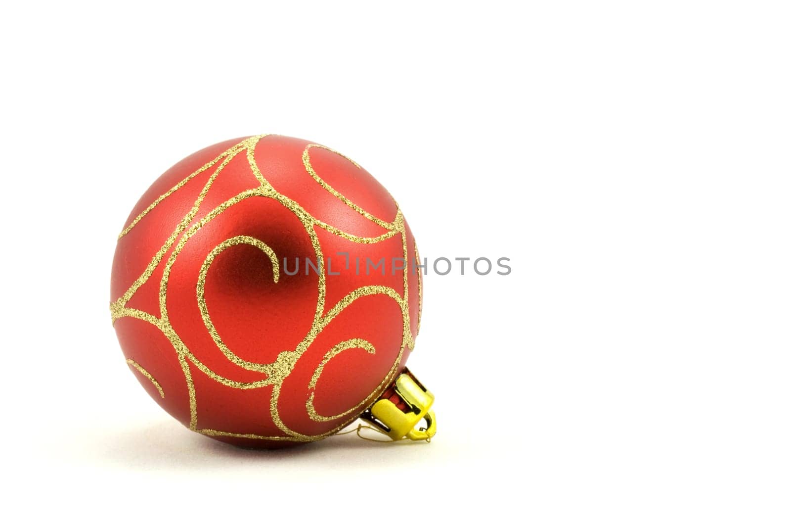 red christmas ball with ornament. Isolated on white